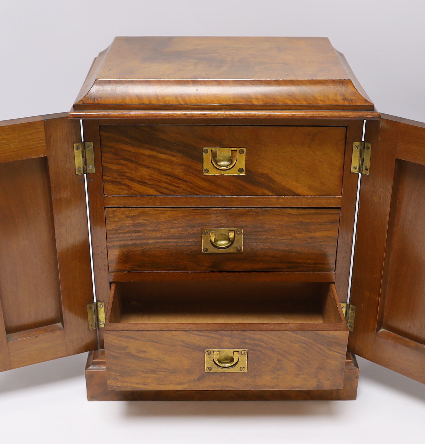 A small Victorian three drawer walnut cabinet, together with a mahogany tea caddy, cabinet 35.5cm x 30cm wide